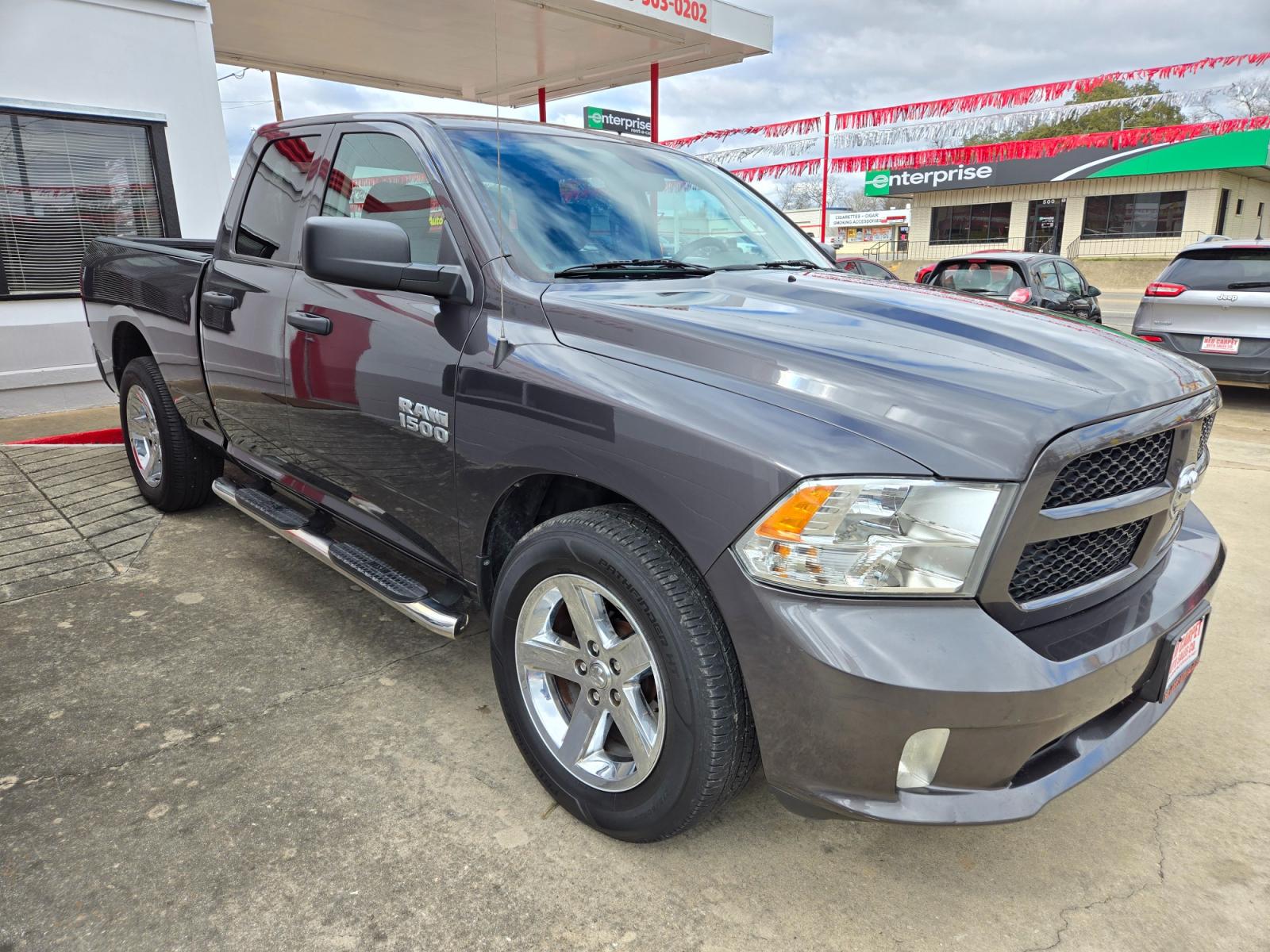 2018 GRAY RAM 1500 (1C6RR6FG9JS) with an 3.6L V6 F DOHC 24V engine, Automatic transmission, located at 503 West Court, Seguin, TX, 78155, (830) 379-3373, 29.568621, -97.969803 - 2018 RAM 1500 Tradesman Quad Cab 2WD with a 3.6L V6 F DOHC 24V, Automatic, Tilt, Cruise, AM/FM Touchscreen Stereo, Power Windows, Locks and Side Mirrors, Bluetooth, Front Bench Seating, Tinted Windows, Alloy Wheels, Towing, Running Boards, Backup Camera and more!! - Photo #1
